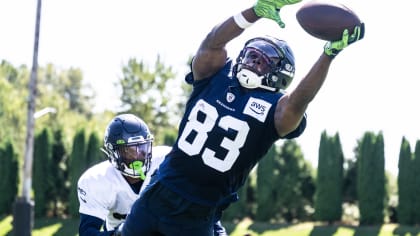 Seattle Seahawks Ken Hamlin jumps in the air as he runs out onto the field  at