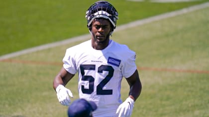 Seattle Seahawks defensive end Darrell Taylor (52) gets set during an NFL  football game against the