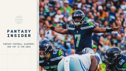 Seattle Seahawks wide receiver Jaxon Smith-Njigba (11) stands with  teammates including tight end Will Dissly (89) and tight end Colby  Parkinson (84) May 22, 2023, at the team's NFL football training facility