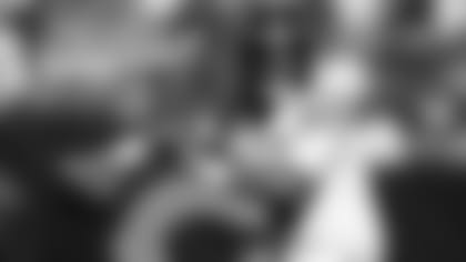 Justin Fields throws the ball against the Green Bay Packers.