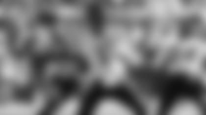 Bears QB Justin Fields actions the Green Bay Packers.