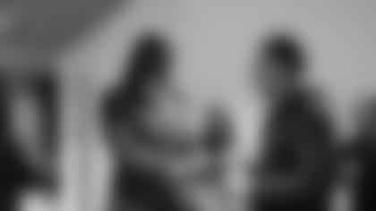 Linebacker Tremaine Edmunds shakes hands with Matt Eberflus after arriving at Halas Hall for the first time on Thursday, March 16, 2023.