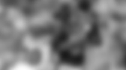 Jessie Bates III gets a hand in.