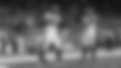 Joe Mixon (left) and Ja'Marr Chase (right) celebrate in the end zone after Mixon's 40-yard touchdown grab in the third quarter against the Detroit Lions.