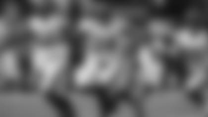 Vonn Bell (24) leads the way.