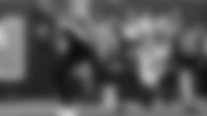 Cincinnati Bengals tight end Cethan Carter, left, runs in a touchdown after breaking a tackle from New England Patriots cornerback Jonathan Jones (31) in the first half of an NFL football game, Sunday, Dec. 15, 2019, in Cincinnati. (AP Photo/Frank Victores)