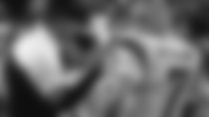 Sam Wyche talks it over with Boomer Esiason back in the day.