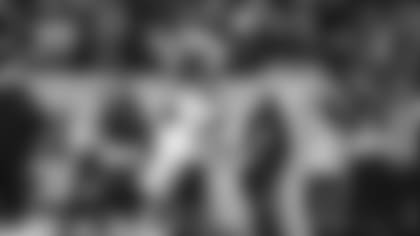 Cincinnati Bengals running back Joe Mixon (28) runs intopo the end zone for a touchdown against the Tennessee Titans during the second half of an NFL divisional round playoff football game, Saturday, Jan. 22, 2022, in Nashville, Tenn. (AP Photo/Mark Humphrey)