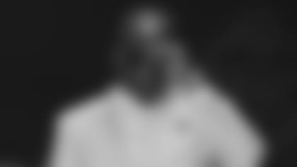 LSU wide receiver Ja'Marr Chase walks down the runway after he was chosen with fifth pick by the Cincinnati Bengals in the first round of the NFL football draft, Thursday, April 29, 2021, in Cleveland. (AP Photo/David Dermer)