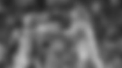 LSU quarterback Joe Burrow (9) celebrates with wide receiver Ja'Marr Chase (1) on their touchdown pass play during the second half of the team's NCAA college football game against Texas A&M in Baton Rouge, La., Saturday, Nov. 30, 2019. LSU won 50-7. (AP Photo/Gerald Herbert)