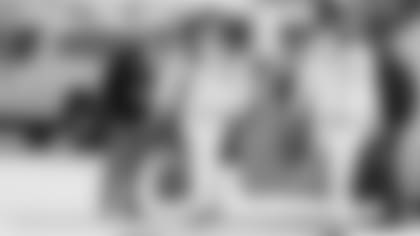 Cincinnati Bengals quarterback Joe Burrow (9) and offensive tackle Jonah Williams (73) arrive at the Los Angeles International Airport for Super Bowl LVI on Tuesday, February 8, 2022 in Los Angeles, California. (Ryan Kang/NFL)