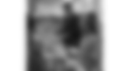 Michael Johnson and the kids help out a Republic Street shelter.