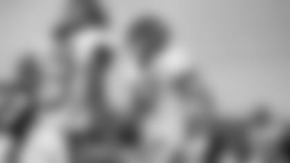 C.J. Uzomah (right) celebrates an Auden Tate (19) TD.