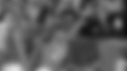 C.J. Uzomah watches Joe Mixon exult.