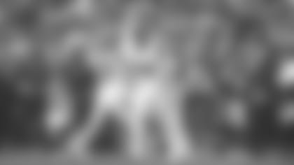 Linebacker Nick Vigil (59) celebrates with teammates after tallying a big strip Monday night to get the Bengals exulting early.