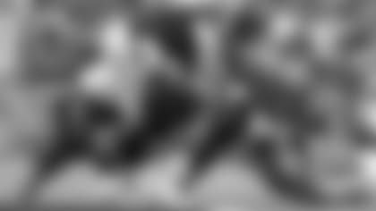 Baltimore Ravens running back Mark Ingram (21) dives in for a touchdown on a run as Cincinnati Bengals linebacker LaRoy Reynolds (55) and outside linebacker Nick Vigil (59) try to stop him during the first half of a NFL football game Sunday, Oct. 13, 2019, in Baltimore. (AP Photo/Gail Burton)