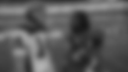 Cedric Benson (right) with Ryan Fitzpatrick helped turn around a winless Bengals season.