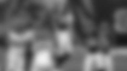 Jordan Evans (50) catches Jessie Bates' tip off a pass to Tyler Eifert (88).