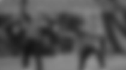 Ryan Finley (5), during his first practice as the starter, in a throwing drill with Andy Dalton.