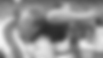 Doug Pelfrey, hoisted by head coach Dave Shula after one of his game winners, predicts greatness for Evan McPherson.