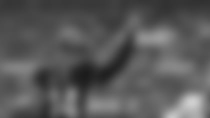 Cincinnati Bengals quarterback Andy Dalton (14) celebrates after scoring a touchdown during an NFL Football game against Washington Redskins at Wembley Stadium in London, Sunday Oct. 30, 2016. (AP Photo/Matt Dunham)