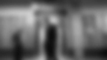 Mike Brown (left) and Zac Taylor wait to make the announcement Taylor is the new head coach.