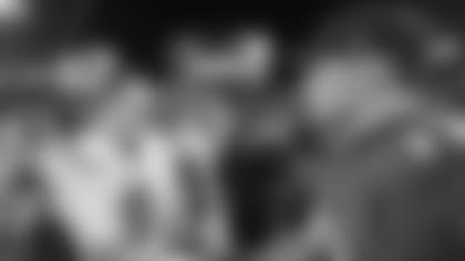 Joe Burrow (left) and Tom Brady meet after Burrow moved to 1-0 lifetime vs. The Goat.