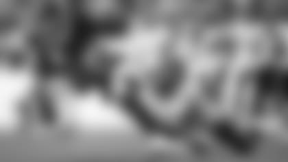 Washington Football Team wide receiver Cam Sims (89) is tackled by Cincinnati Bengals outside linebacker Jordan Evans during the first half of a preseason NFL football game Friday, Aug. 20, 2021, in Landover, Md. (AP Photo/Nick Wass)