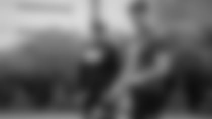 Joe Burrow (9) and head coach Zac Taylor head back to work in May.