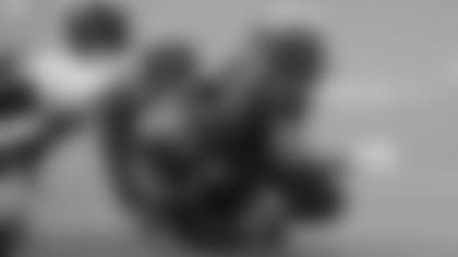 Cincinnati Bengals defensive end Carlos Dunlap (96) and Germaine Pratt (57) tackle Cleveland Browns running back Nick Chubb (24) during the first half of an NFL football game, Sunday, Dec. 8, 2019, in Cleveland. (AP Photo/Ron Schwane)