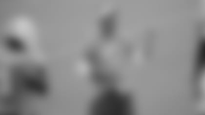 Miami Dolphins defensive backs coach Lou Anarumo, center, talks with cornerback Bobby McCain (28) and defensive back Sammy Seamster (37) at the teams NFL football training camp, Wednesday, Aug. 5, 2015 in Davie, Fla. (AP Photo/Wilfredo Lee)