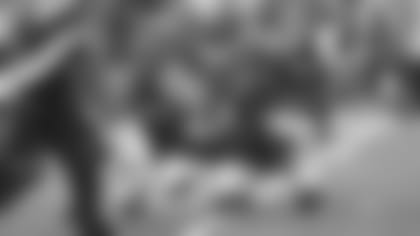 Center Trey Hopkins (with ball) is in middle of it all Sunday.