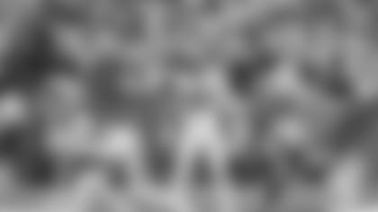 Logan Wilson (55) in the middle of it all.