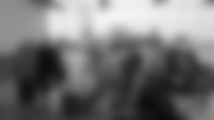 S Jessie Bates III hosts an outing at Top Golf as part of his Single Moms Weekend.