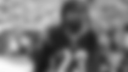 191201-Webb-BW_salute_fans_field (AP)