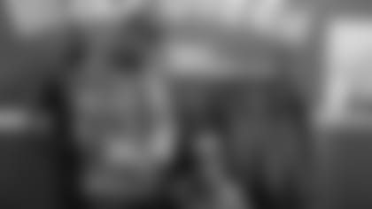 Means Cameron went from selling clothes out of the trunk of his car to a wall of fame in his Elm Street storefront.