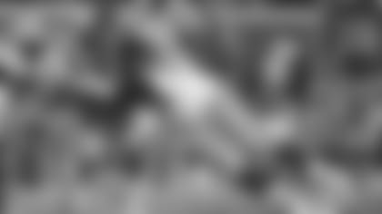 FILE - LSU nose tackle Tyler Shelvin (72) tackles Mississippi wide receiver Elijah Moore (8) during the second half of an NCAA college football game in Oxford, Miss., Saturday, Nov. 16, 2019. LSU coach Ed Orgeron says defensive lineman Neil Farrell has rejoined the team after initially opting out more than a month ago. Orgeron says he's also hearing “rumblings” that defensive lineman Tyler Shelvin could opt back. (AP Photo/Thomas Graning, File)