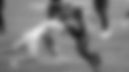 Cincinnati Bengals quarterback Joe Burrow (9) runs past Los Angeles Chargers' Rayshawn Jenkins (23) for a touchdownon , Sunday, Sept. 13, 2020, in Cincinnati.