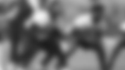 O-line coach Jim Turner likes the way guard John Miller (right) and Bobby Hart (left) are playing on the right side.