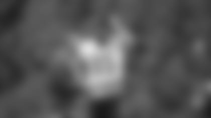 The Bengals are going to take it slow with Tee Higgins, seen here with wide receivers coach Troy Walters.