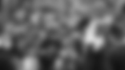 Carlos Dunlap (96) made Lamar Jackson (8) pause on this one.