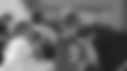 Joe Burrow lets one go at practice.