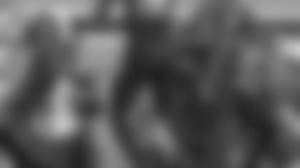 North Carolina State's Nick McCloud (21) and Stephen Louis (12) congratulate Germaine Pratt (3) following Pratt's touchdown against Louisville during the second half of an NCAA college football game in Raleigh, N.C., Thursday, Oct. 5, 2017. North Carolina State won 39-25. (AP Photo/Gerry Broome)