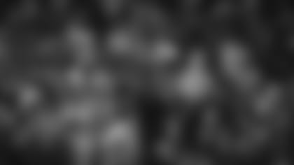 Fans watch during the second half of an NFL wild-card playoff football game between the Cincinnati Bengals and the Las Vegas Raiders, Saturday, Jan. 15, 2022, in Cincinnati. (AP Photo/Jeff Dean)