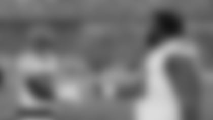 S Jessie Bates III (left) shakes DT DJ Reader's hand before kickoff of the Bengals-Bills divisional game at Highmark Stadium on Sunday, January 22 2023.