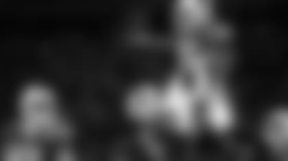 Josh Allen (17) lifts up Devin Singletary (26) after scoring a touchdown. Buffalo Bills vs New England Patriots - Wild Card Playoff game at Highmark Stadium, January 15, 2022. Photo by Ben Green