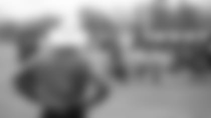 Sean McDermott watches the rookie team photo after practice during the first day of Rookie Mini Camp at One Bills Drive on May 13, 2022. Photo by Ben Green