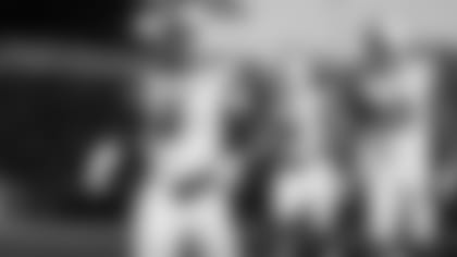 Utah running back Zack Moss (2) celebrates after scoring a touchdown during the second half of an NCAA college football game against Washington, Saturday, Nov. 2, 2019, in Seattle. Utah won 33-28. (AP Photo/Stephen Brashear)