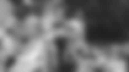 Quarterback Josh Allen makes a throw over the middle during Friday's practice.