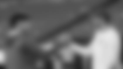 Kansas City Chiefs quarterback Patrick Mahomes, left, greets Buffalo Bills quarterback Josh Allen during pre-game warmups before an NFL football game, Sunday, Oct. 10, 2021 in Kansas City, Mo. (AP Photo/Reed Hoffmann)